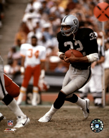 Marcus Allen - Black Uniform With Ball