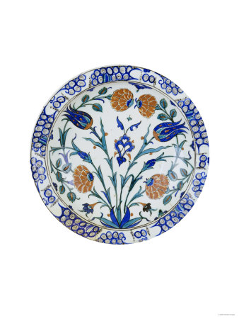 An Iznik Pottery Dish with Tulip and Peony Design, circa 1575