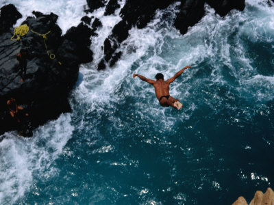 Clavadista (Cliff Diver) Jumping into Canal, Acapulco, Guerrero, Mexico