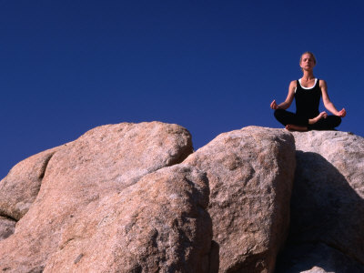 Yoga on the Rocks in the Joshua Tree National Park, California, USA
