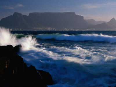 Buy Wave Crashing on Rocks with Table Mountain in Distance, Cape Town, South Africa at AllPosters.com