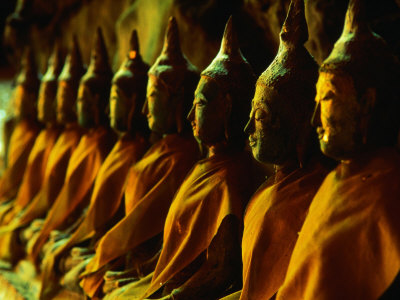 Nine Buddha Statues Sitting in Row in Khao Luang Caves, Phetburi, Phetchaburi, Thailand