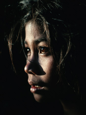 Afternoon Sunlight Profiles a Young Female Villager from the Lake Batur Region, Batur, Indonesia
