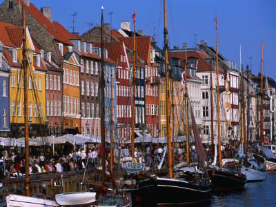 Yachts Moored in Front of Cafes at Nyhavn, Copenhagen, Denmark