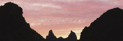 Silhouette of Mule Ears Peak at Sunrise, Chisos Mountains, Big Bend National Park, Texas, USA