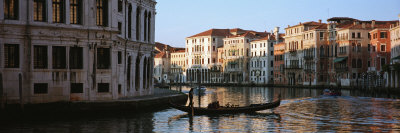 Man on a Gondola in a Canal, Grand Canal, Venice, Italy