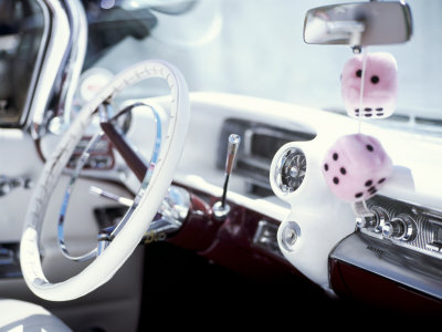 Close-Up of Steering Wheel and Interior of a Pink Cadillac Car