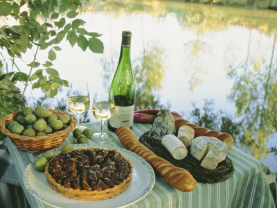 Food and Wine on a Table Beside the River Loire, France