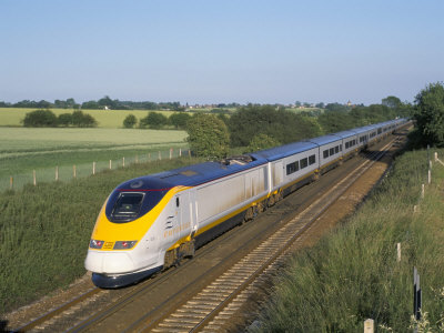 Eurostar Train Travelling Through Countryside