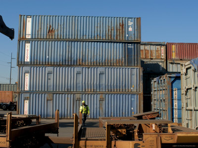 Worker Walks Towards Rail Car, Washington State, USA
