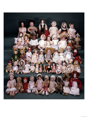 A Collection of German and French Bisque Headed Dolls