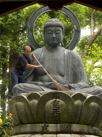 Man Cleaning a Buddha Statue, Shinnyo-Do Temple, Kyoto, Kinki, Japan