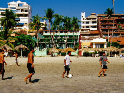 Locals Playing Soccer on la Madera Beach, Zihuatanejo, Guerrero, Mexico