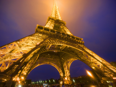 Base of Eiffel Tower at Night, Paris, France