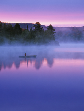 Canoeist on Lake at Sunrise, Algonquin Provincial Park, Ontario, Canada