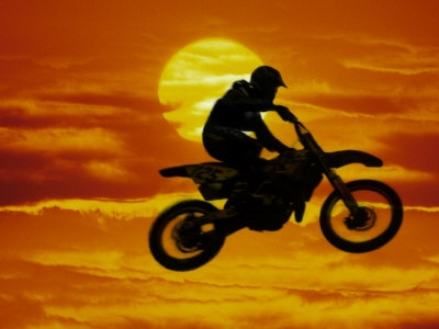 Digital Composite of Motocross Racer Doing Jump