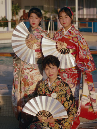 Portrait of Three Young Women in Traditional Kimonos Holding Fans, Tokyo, Japan, Asia
