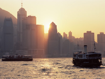 Star Ferries, Victoria Harbour and Hong Kong Island Skyline at Sunset, Hong Kong, China, Asia