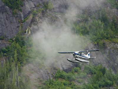 Buy Float Plane against Granite Cliff, Alaska at AllPosters.com
