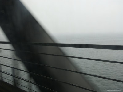 Series of Motion Frames Outside Window of Train Crossing Bridge at High Speed, Copenhagen, Denmark