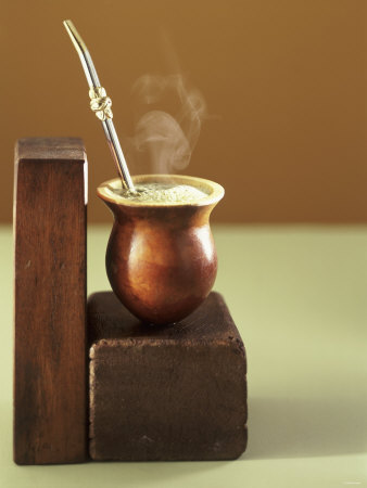 Beaker of Chimarrao with Silver Straw on Wood