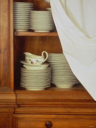 Crockery in Kitchen Cupboard