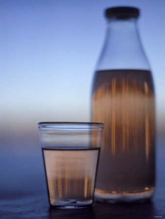 Rhubarb Juice in Glass and Bottle