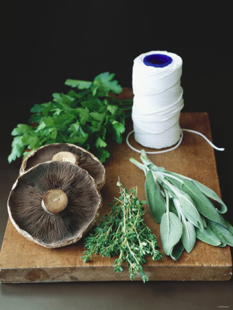 Mushrooms, Fresh Herbs & Kitchen String on Chopping Board
