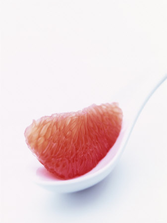 Grapefruit Segment on White Spoon