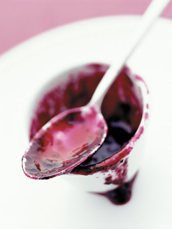 A Spoon with Red Jam