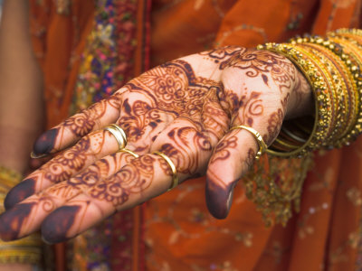 Buy Wedding Guest Showing Henna Marking on Her Hand, Dubai, United Arab Emirates at AllPosters.com