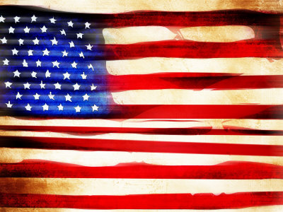 Old Fashioned Weathered American Flag Waving in the Wind