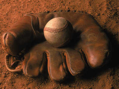 Baseball Glove with Ball on Dirt Poster