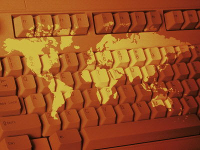 World Map Projected on Computer Keyboard Posters