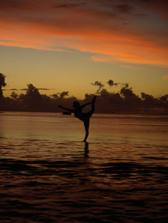 Woman Doing Yoga in Water at Sunset, Tahiti