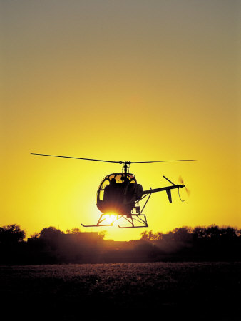Helicopter with Sun Setting