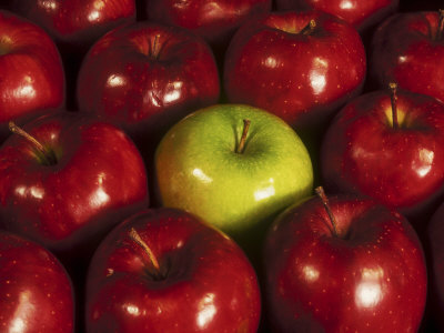 Green Apple Among Red Apples
