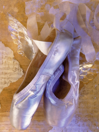 Ballet Slippers Over Wings and Music Sheet