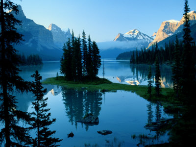 Buy Scenic View of the Lake Surrounded by Evergreens and Snow-Capped Mountains at AllPosters.com