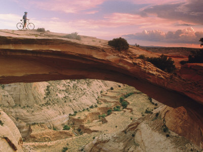 Buy Mountain-Biking over a Natural Arch at AllPosters.com