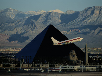 A Jet Flies Past the Luxor Hotel, the Worlds Fourth Largest Pyramid