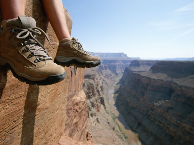 Buy The Boot-Shod Feet of a Hiker Dangle over the Side of a Cliff at AllPosters.com