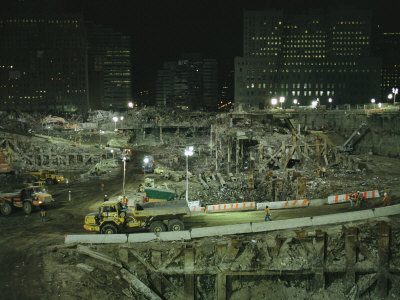 Buy An Elevated View of Ground Zeros Devastation at Night; Crews, Their Vehicles, and Other Equipment at AllPosters.com