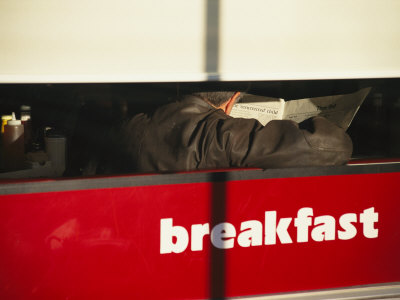 An Early Morning Diner Reads the Paper in Downtown Santa Fe