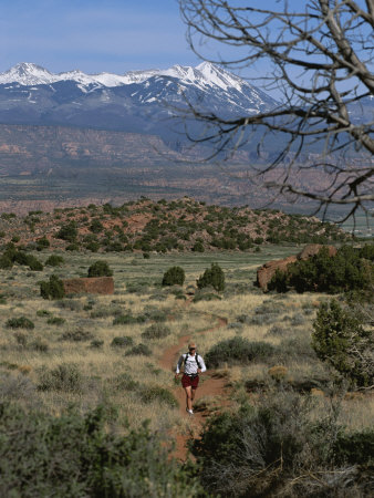 A Runner on the Hidden Valley Trail Above Moab, Utah