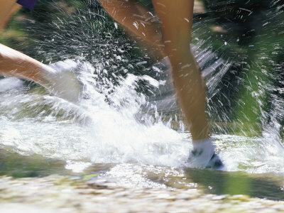 Buy Runners Legs Splashing Through a Creek at AllPosters.com