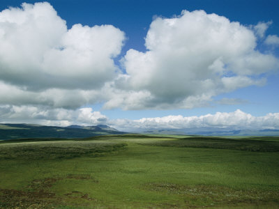 Buy Billowing Clouds over a Pastoral Landscape at AllPosters.com
