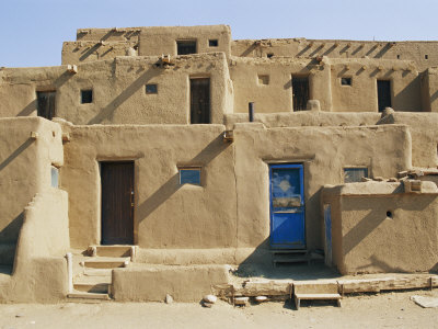 Bright Sunshine Casts Harsh Shadows on This Southwestern Adobe Pueblo Structure