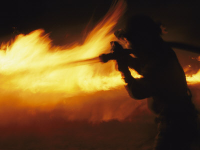 Buy Fire-Fighter Battling a Blaze at Night at AllPosters.com