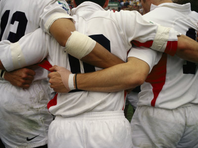 Buy Rugby Players Huddle in a Scrum at the Annual Rugby Sevens at AllPosters.com